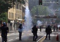 Un'azione di repressione compiuta dalla  Polizia, durante il G8