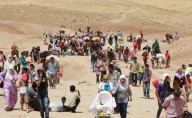 Profughi siriani in fuga attraverso il Libano